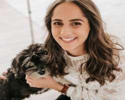 Holsman loves dog and has adopted one in her home Holsman loves dog and has adopted one in her home.